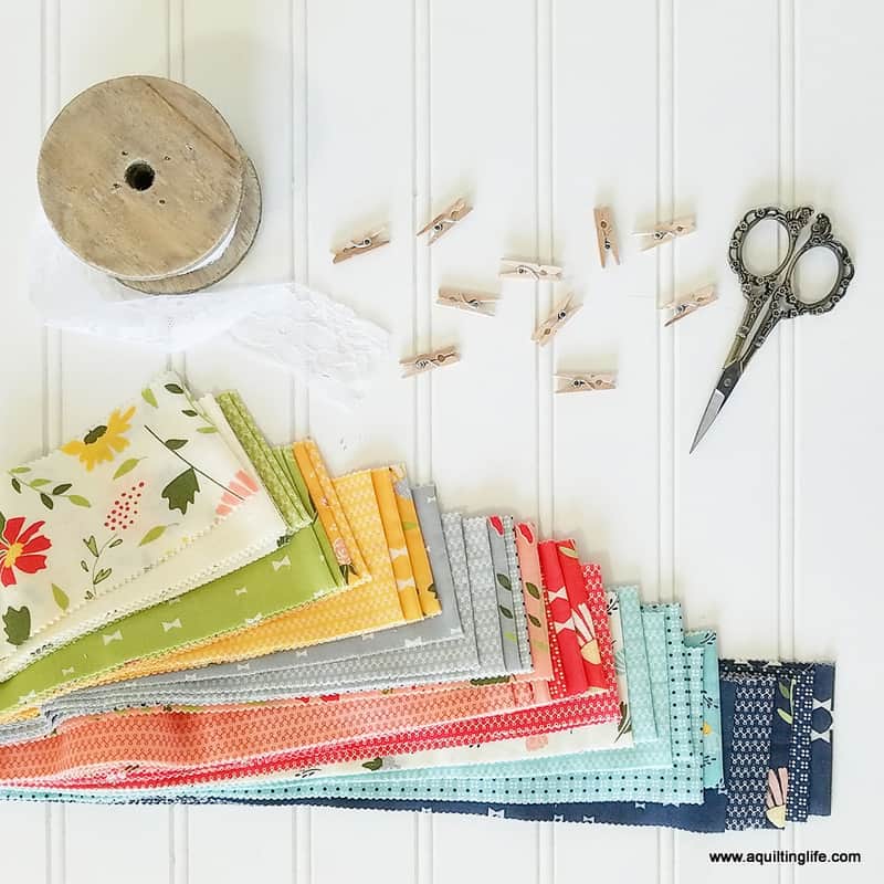 Tips for Pressing Quilt Strip Sets featured by top US quilting blog, A Quilting Life: image of Clover Hollow Jelly Roll Strips