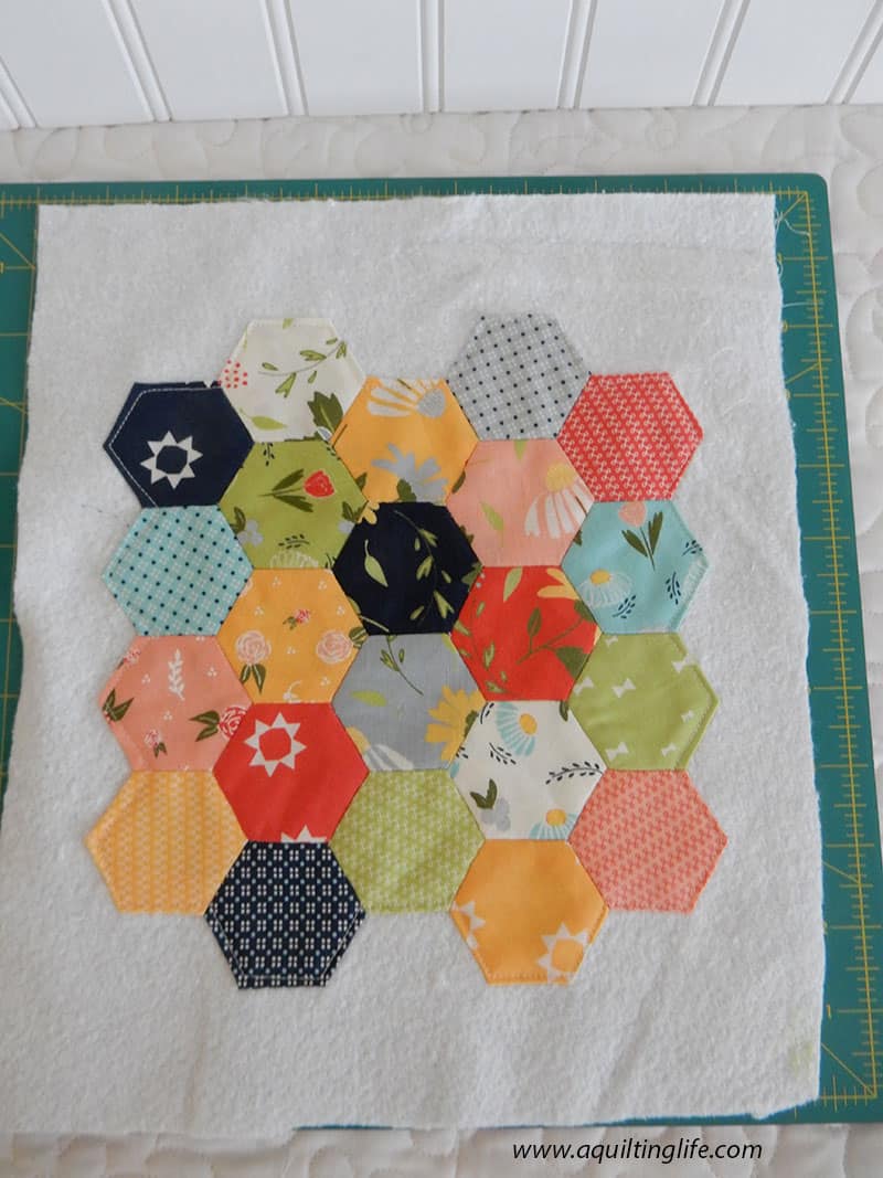 hexagons sewn to batting