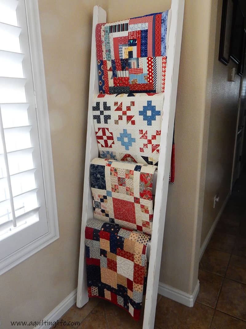 patriotic quilts on ladder