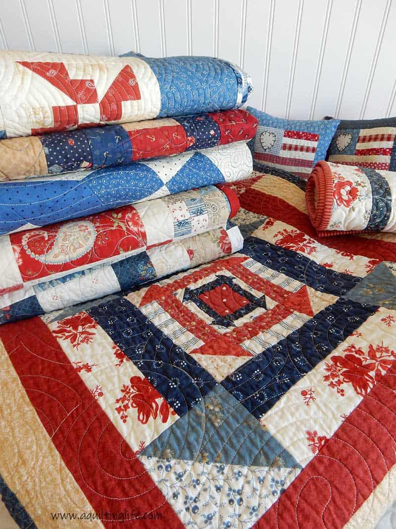Patriotic quilts, pillows, and runners