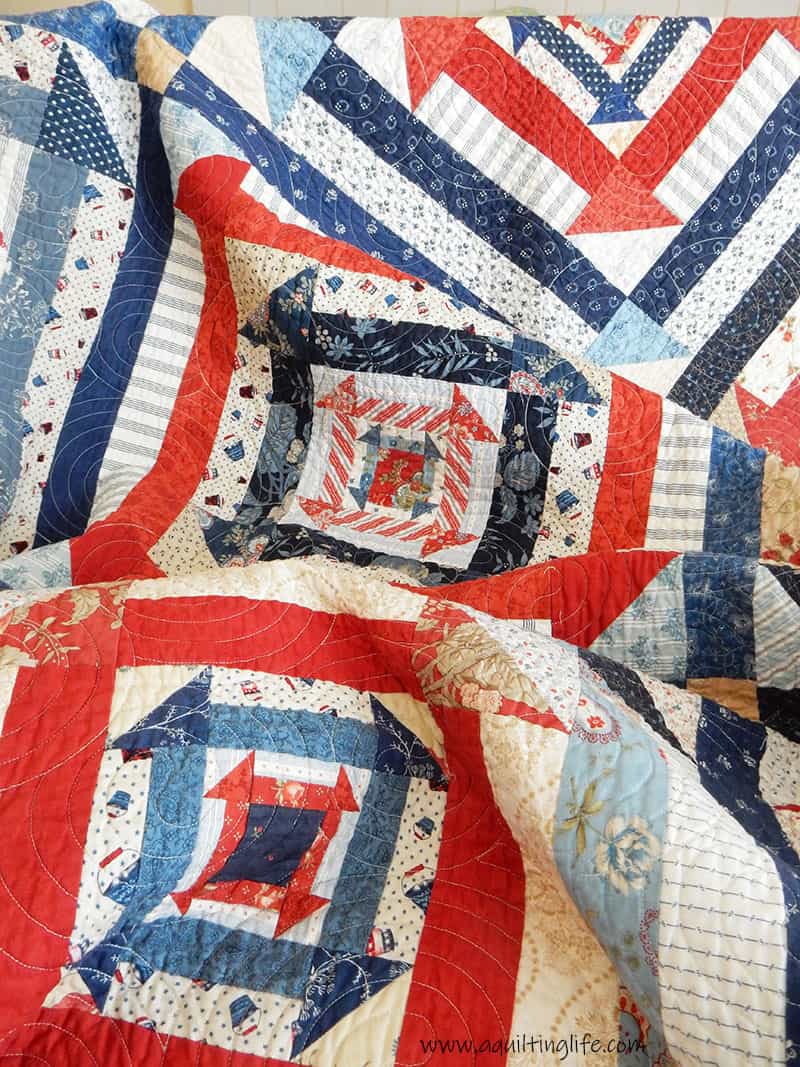 Scrappy Churn Dash Red, White and Blue Quilt