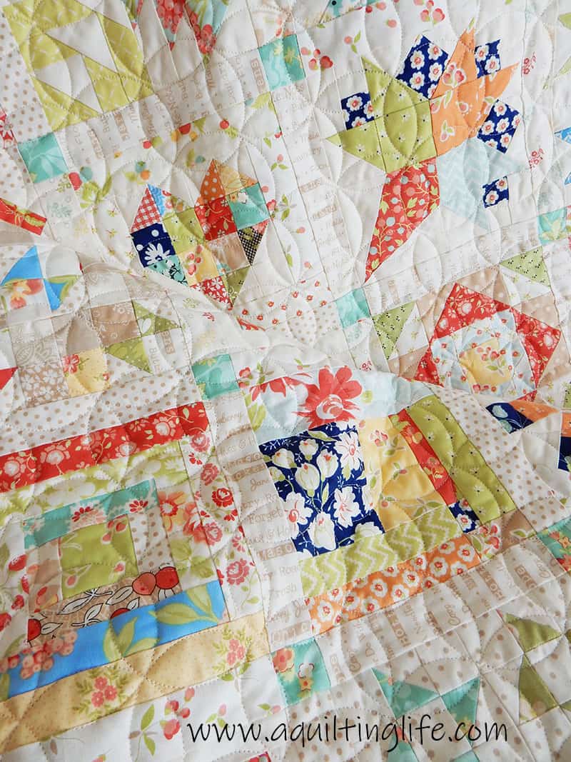 Scrap Quilt Ideas & Tips featured by top US quilting blog, A Quilting Life: image of Scrappy Splendid Sampler Quilt