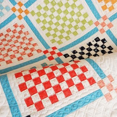 Scrappy Patchwork Quilt | Stash Busting Quilts Projects and Ideas featured by top US quilting blog, A Quilting Life