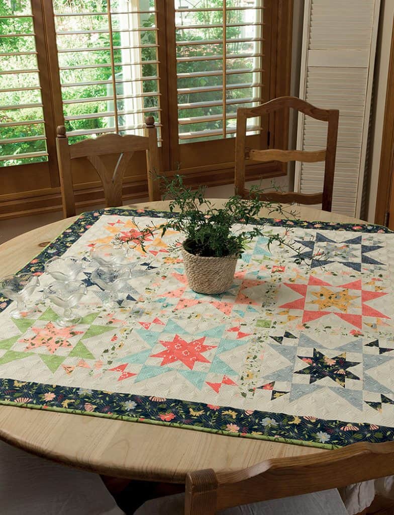 Beautiful Quilts featured by top US quilting blog A Quilting Life | Sunday Best Sampler Quilt Along Week 1 by popular quilting blog, A Quilting Life: image of a table topper quilt.