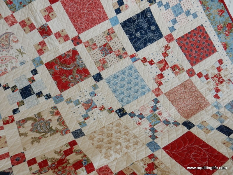 closeup of hometown summer | Amazing 4th of July Quilts! by popular quilting blog, A Quilting Life: image of a red, white, and blue quilt.