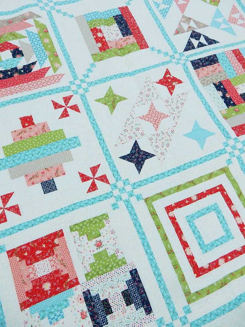 Sunday Best Sampler Quilt by popular quilting blog, A Quilting Life: close up image of sampler quilt.