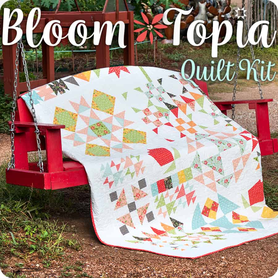 Bloom-Topia Quilt Kit | Bloom-Topia Charity Quilt Along by popular US quilting blog, A Quilting Life: image of a Bloom Topia quilt kit ad.
