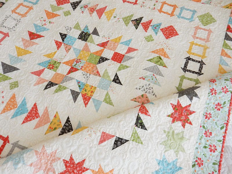 Gelato Quilt | Gelato Medallion Quilt Pattern by popular US quilting blog, A Quilting Life: image of a Gelato Medallion quilt with scrappy star center.