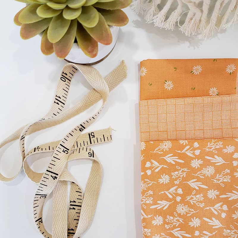 Summer Sweet Orange | Summer Sweet Fabric Color Stories & Prints by popular quilting blog, A Quilting Life: image of Summer Sweet Fabric orange precuts.