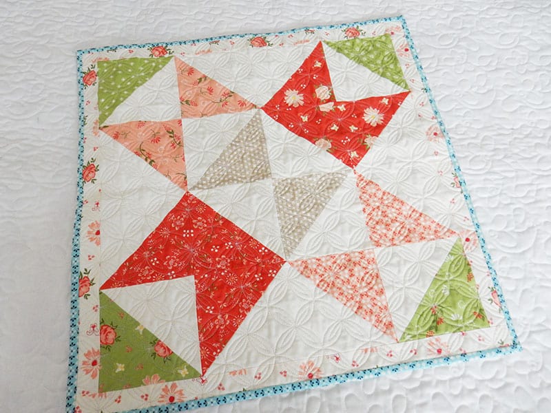 Moda Schoolhouse Blog Hop | Moda Schoolhouse Blog Hop | Free 18" Block Pattern by popular quilting blog, A Quilting Life: image of a Spring Market Moda Schoolhouse block.