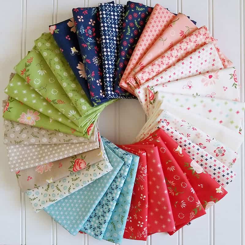 Harper's Garden | Harper's Garden Shop Update & Life Lately by popular US quilting blog, A Quilting Life: image of a bundle of Harper's Garden Shop fabrics.