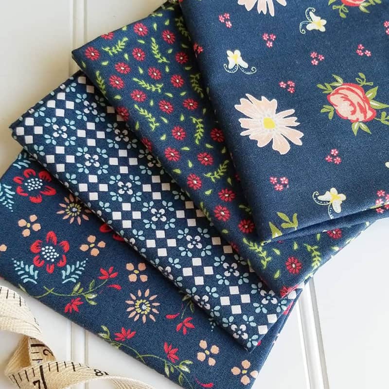 Harper's Garden Fabric Solid Coordinates featured by. top US quilting blog, A Quilting Life: image of Harper's Garden Navy Prints