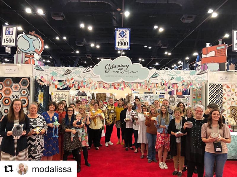 Moda Crew International Quilt Market Fall 2019 | International Quilt Market Fall 2019: Part 1 by popular Utah quilting blog, A Quilting Life: image of a group of of people.
