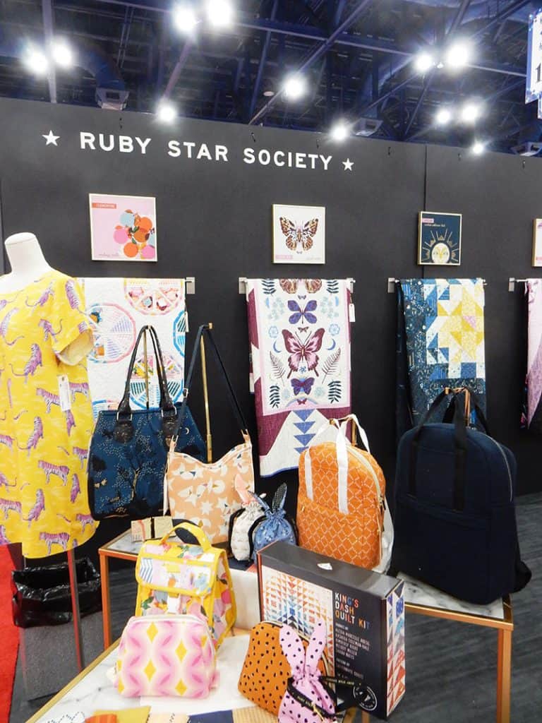 Moda Booths Part 2: International Quilt Market Fall 2019 by popular Utah quilting blog, A Quilting Life: image of the Ruby Star Society booth.
