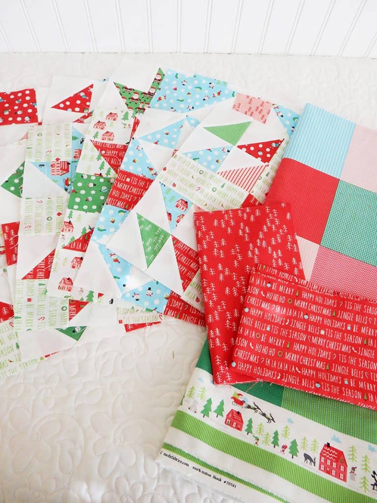 Works in Progress | Fourth Quarter Quilting Goals by popular Utah quilting blog, A Quilting Life: image of a Christmas fabrics. 