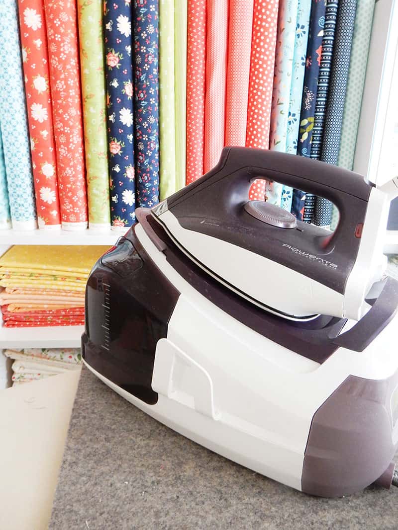 9 Pressing Essentials for Quilters featured by top US quilting blog, A Quilting Life: image of a Rowenta Perfect Steam Iron