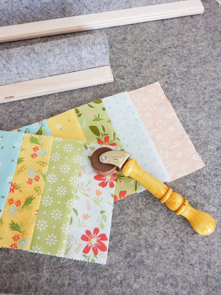 9 Pressing Essentials for Quilters featured by top US quilting blog, A Quilting Life: image of Pressing Bars and Seam Roller