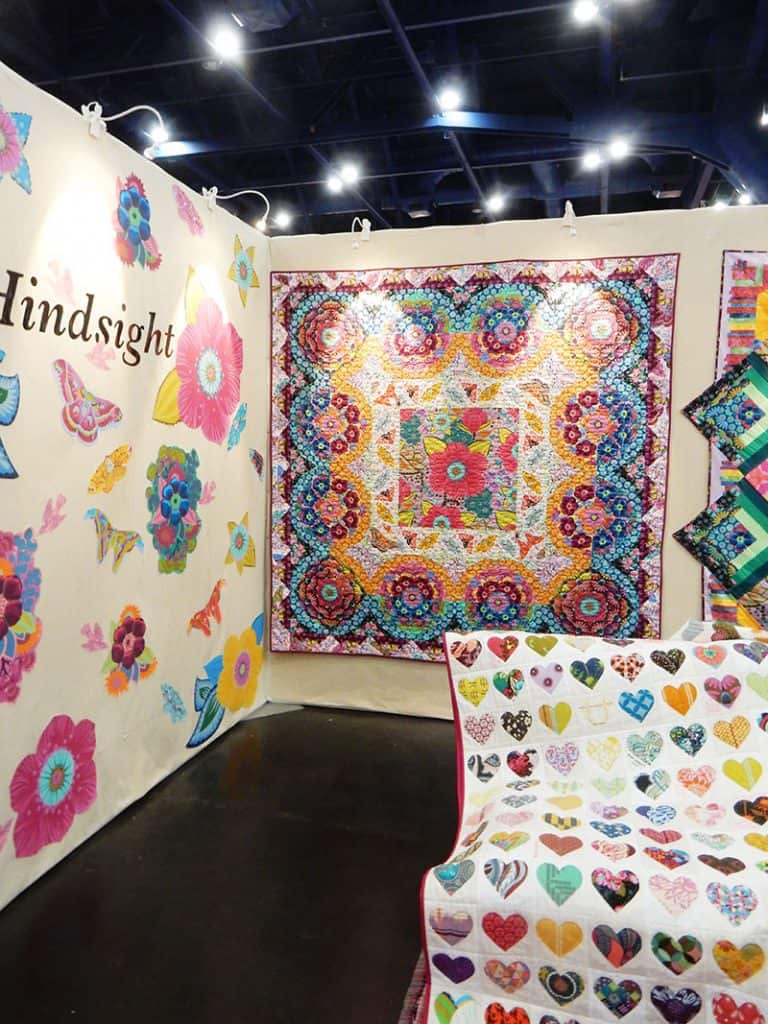 Anna Maria Horner booth from Fall 2019 International Quilt Market | More Inspiration from the Houston Quilt Market by popular Utah quilting blog, A Quilting Life: image of the Anna Marie Horner quilting booth. 