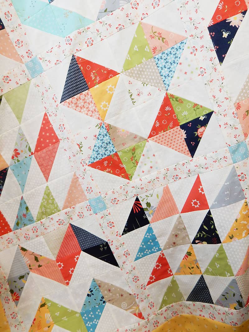 How to Make a Scrap Quilt by popular Utah quilting blog, A Quilting Life: image of a Quilting Life BOM 2019