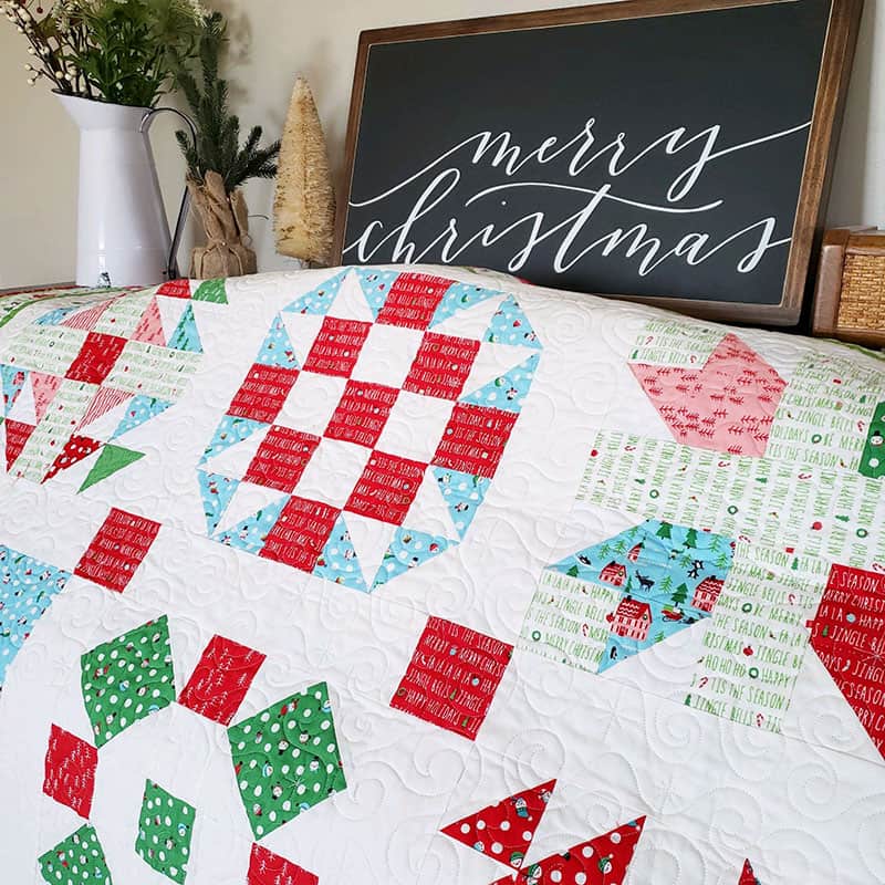 Christmas Sampler Quilt featured by top US quilting blog, A Quilting Life.