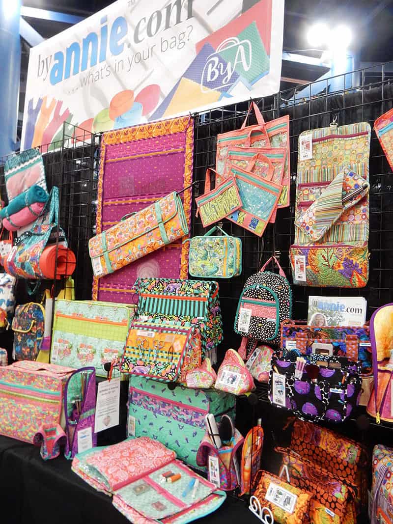 by annie booth from fall 2019 International quilt market | More Inspiration from the Houston Quilt Market by popular Utah quilting blog, A Quilting Life: image of the By Annie quilting booth. 