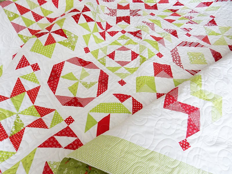 Red & green Christmas Half-Square Triangle Quilt