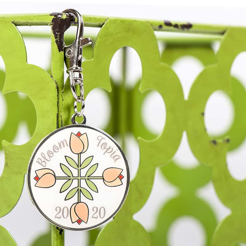 Saturday Seven 109 featured by Top US Quilting Blog, A Quilting Life: image of Bloomtopia Key chain.