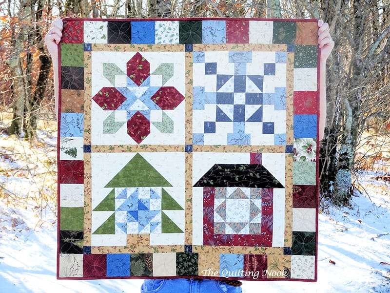 Christmas Mini Quilt | Star Drop pillow | Minis & More | Small Quilting Project Ideas by popular Utah quilting blog, A Quilting Life: image of a Christmas mini quilt. 