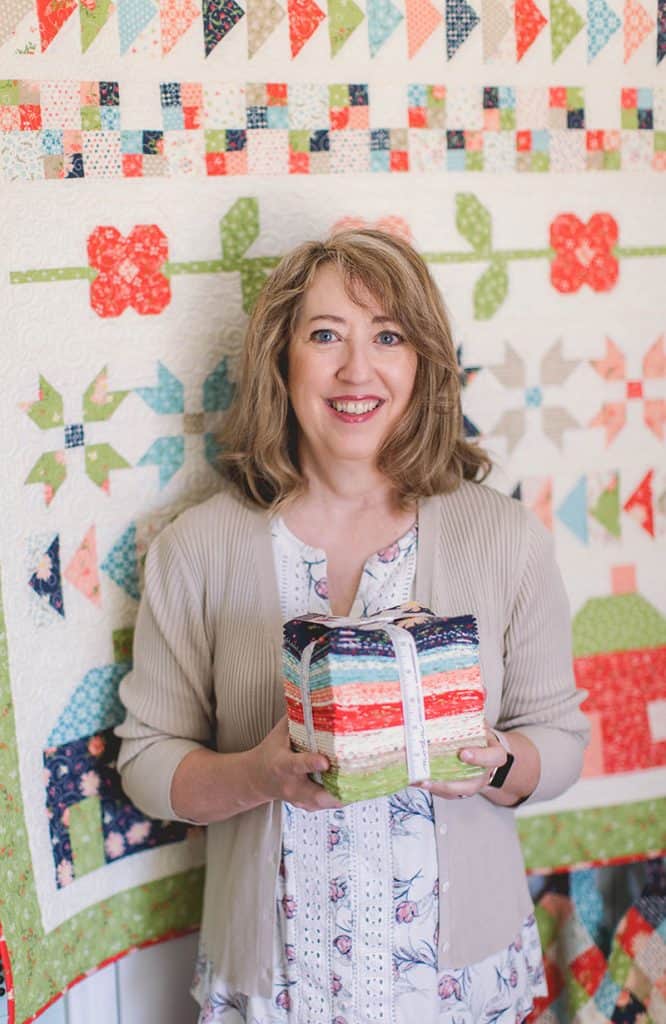 10 Quilt Piecing Tips & Tricks featured by Top US Quilting Blog, A Quilting Life: image of Sherri from A Quilting Life