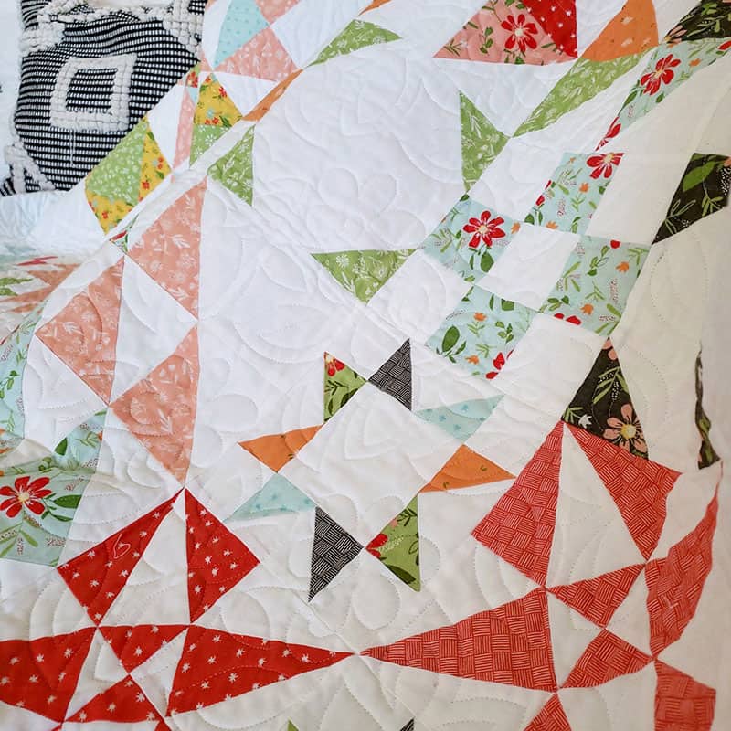 Saturday Seven 113 featured by Top US Quilting Blog, A Quilting Life: image of Bloomtopia Quilt.