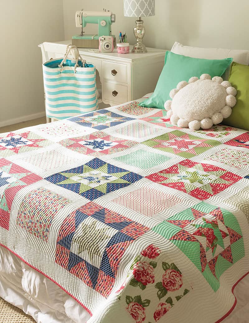 Labor of Love Quilts Part 2 featured by Top US Quilting Blog, A Quilting Life: image of Whimsy Stars Quilt