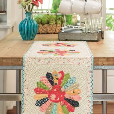 Labor of Love Quilts Part 1 featured by Top US Quilting Blog, A Quilting Life: image of Scrappy Dresden Runner