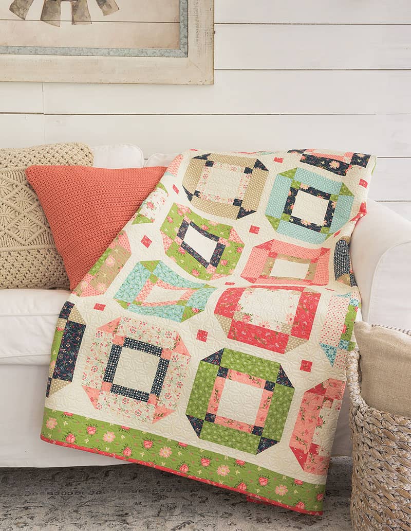 Labor of Love Quilts Part 1 featured by Top US Quilting Blog, A Quilting Life: image of Garden Path quilt