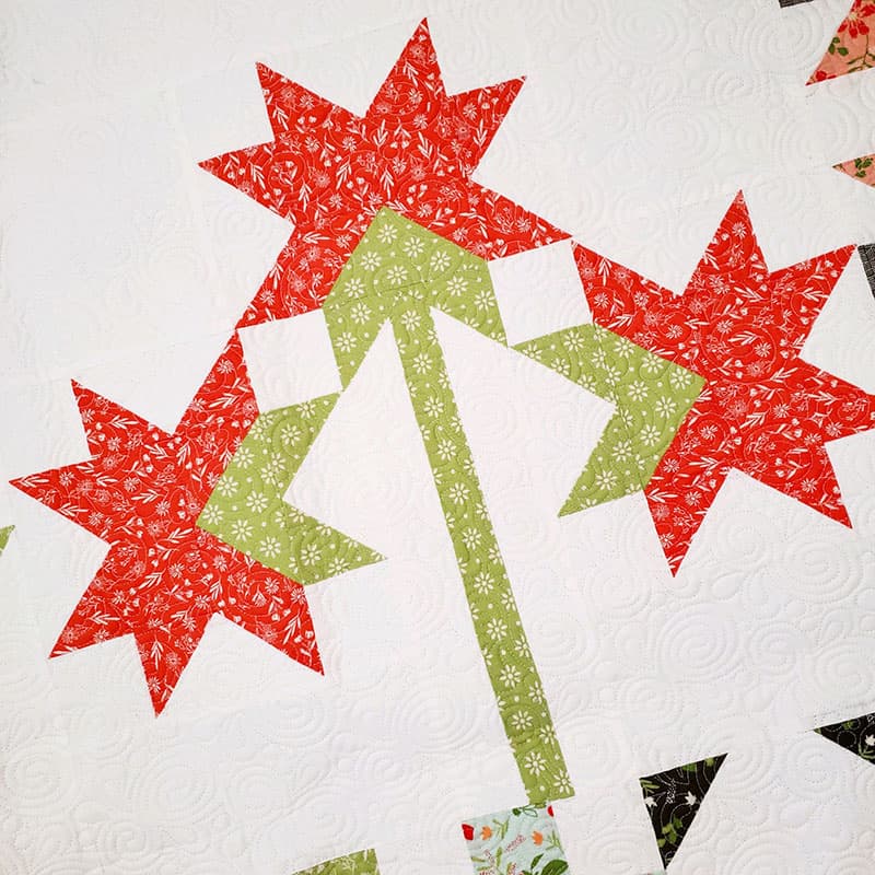 Saturday Seven 116 featured by Top US Quilting Blog A Quilting Life: image of Carolina Lily quilt block