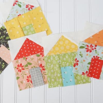 Works in Progress featured by Top US Quilting Blog, A Quilting Life: image of house quilt blocks