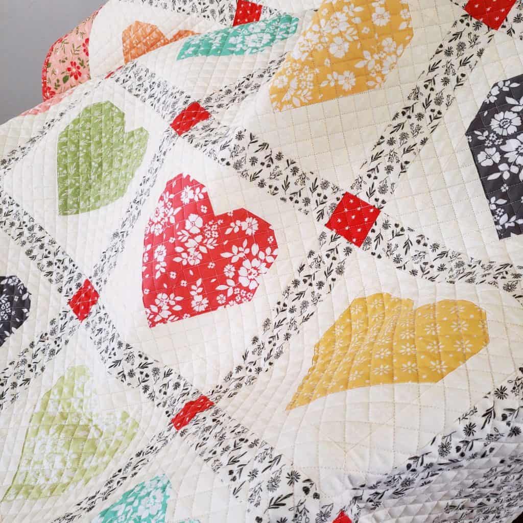 Lovely Heart Quilt Pattern featured by Top US Quilting Blog, A Quilting Life: image of the Lovely Heart Quilt Pattern