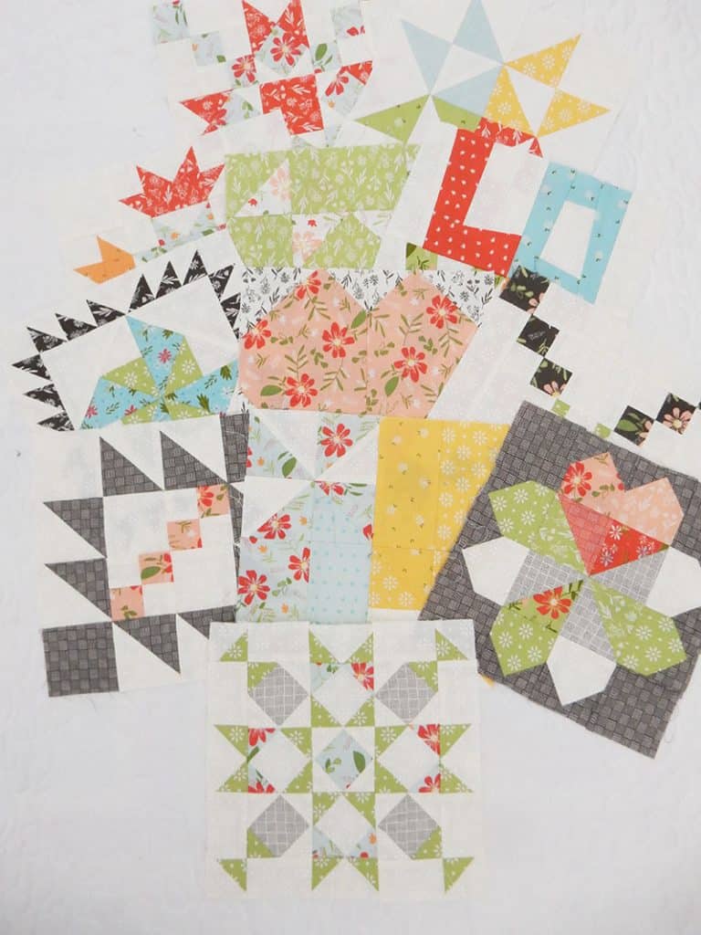 Moda Block Heads 3 block 12 featured by Top US Quilting Blog, A Quilting Life: image of blocks 1-12