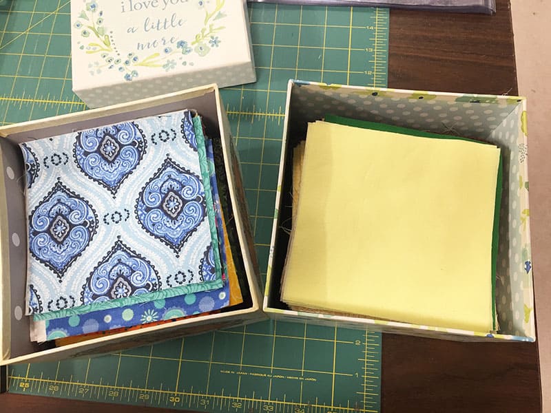 Scraps Along March Challenge featured by Top US Quilting Blog, A Quilting Life: image of charm pack storage