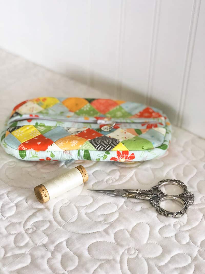 Patchwork Pouch in Summer Sweet Fabrics featured by Top US Quilting Blog, A Quilting Life: image of pouch and notions.