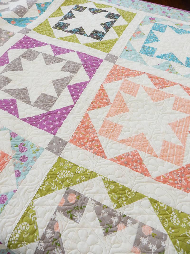 Carefree Fat Quarter Quilt Pattern featured by Top US Quilting Blog, A Quilting Life: image of Carefree Quilt