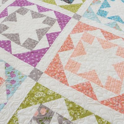 Carefree Fat Quarter Quilt Pattern Featured by Top US Quilting Blog, A Quilting Life: image of Carefree fat quarter quilt