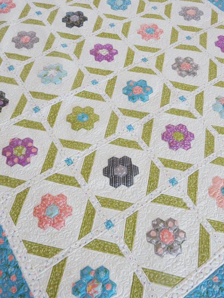 Moda Block Heads 3 Block 13 featured by Top US Quilting Blog, A Quilting Life: image of Blooms Quilt