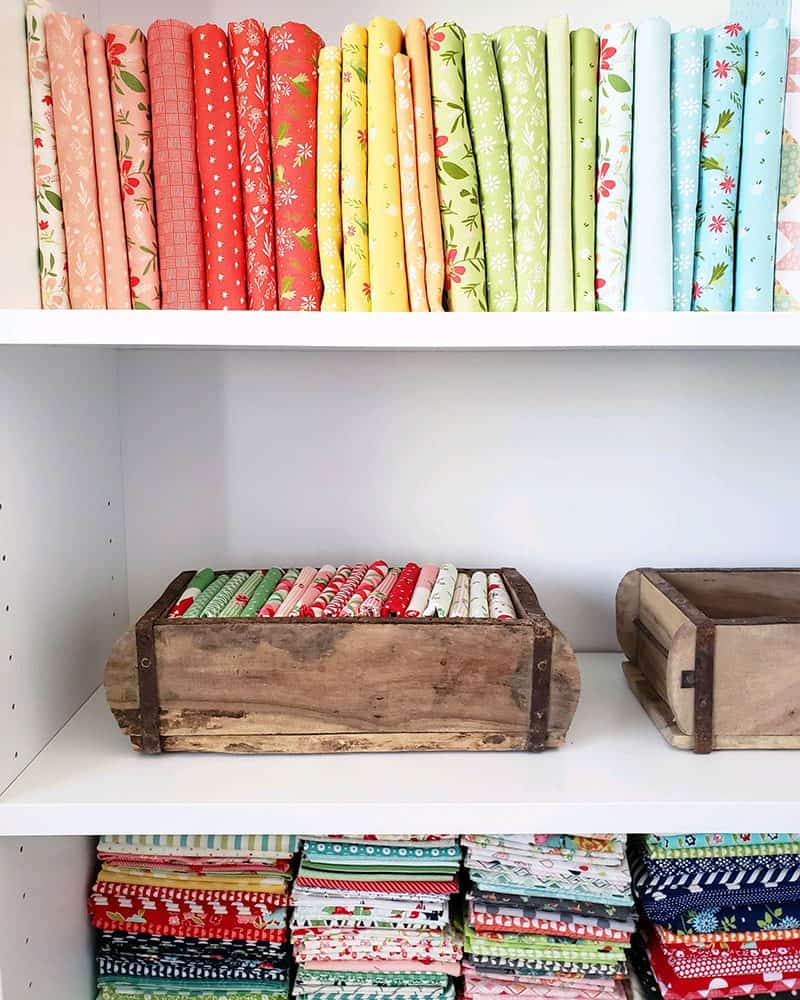 Tips for Small Sewing Spaces featured by Top US Quilting Blog, A Quilting Life: image of sewing room shelves