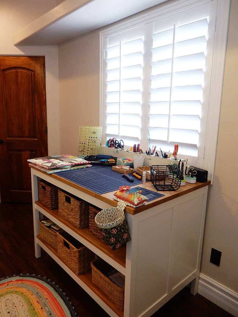 Sewing Room Tour featured by Top US Quilting Blog, A Quilting Life: image of sewing room worktable