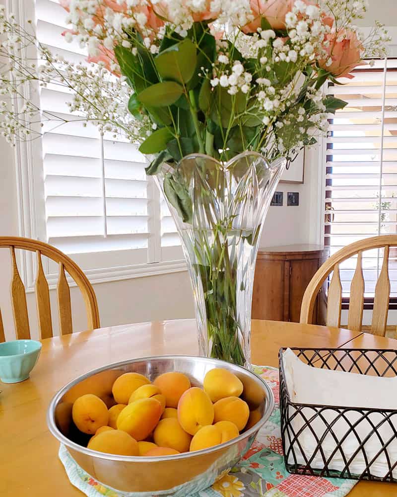 Moda Block Heads 3 + This & That featured by Top US Quilt Blog, A Quilting Life: image of flowers and fruit on the table