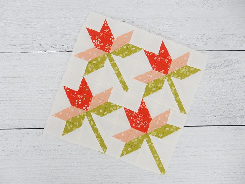 Moda Block Heads 3 block 18 featured by Top US Quilting Blog, A Quilting Life: image of mini lilies block