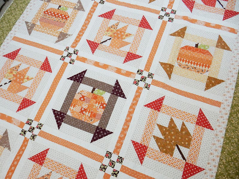 Fall Dash featured by Top US Quilting Blog, a Quilting Life: image of scrappy fall quilt