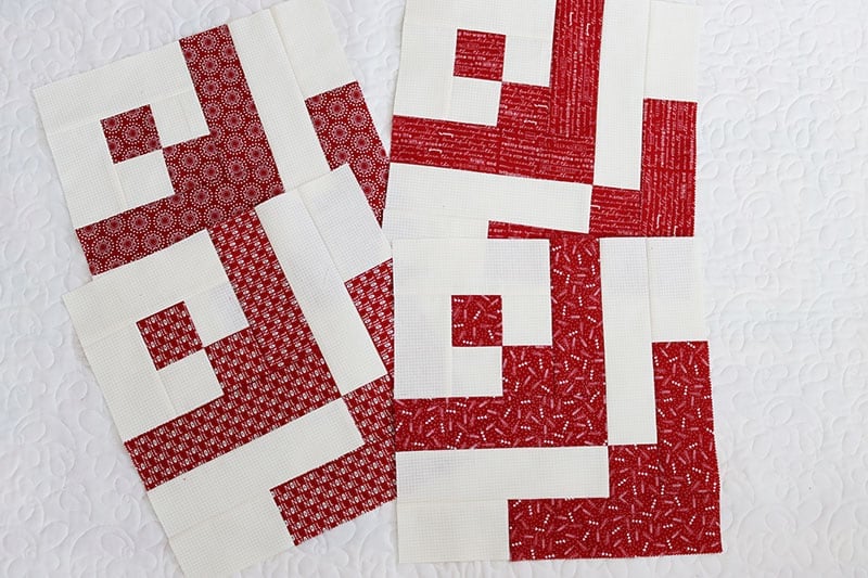 Jelly Snowflake Mystery Quilt Block 1 featured by Top US Quilting Blog, A Quilting Life: image of Jelly Snowflake blocks.