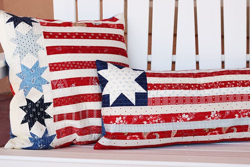 Saturday Seven 134 featured by Top US Quilting Blog, A Quilting Life: image of patriotic pillows.