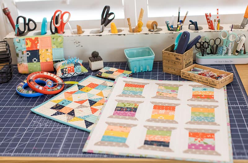 Saturday Seven 132 featured by Top US Quilting Blog, A Quilting Life: image of work table